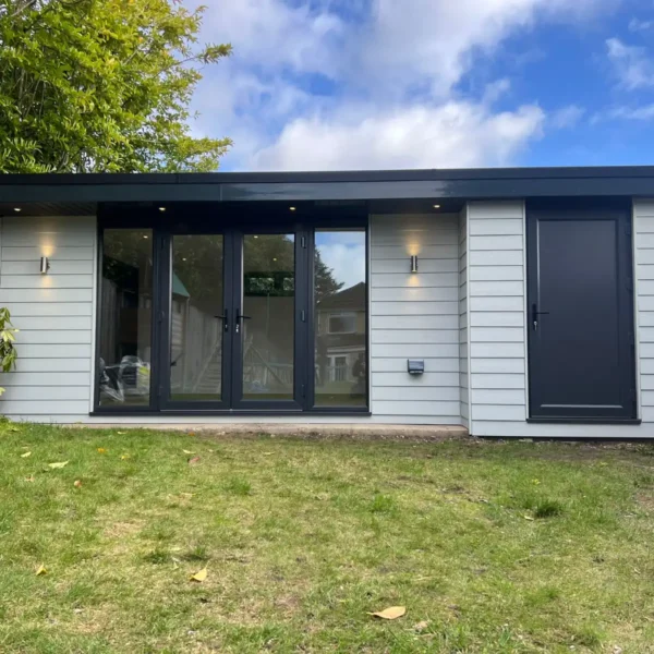 White Garden Room with a Black Door