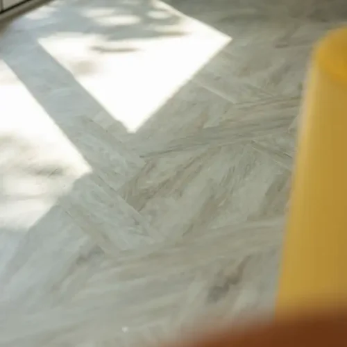 Herringbone light wood flooring