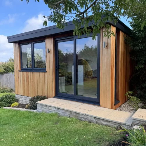 Swanage Garden Room with pathway and wooden cladding