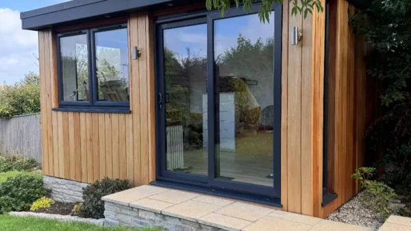 Swanage Garden Room with pathway and wooden cladding